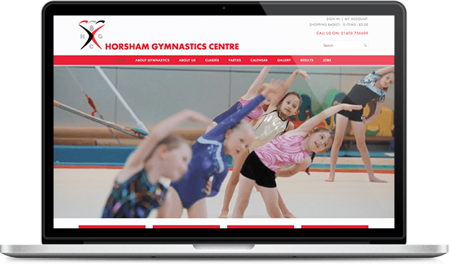 laptop showing Horsham Gymnastics Club website responsive redesign